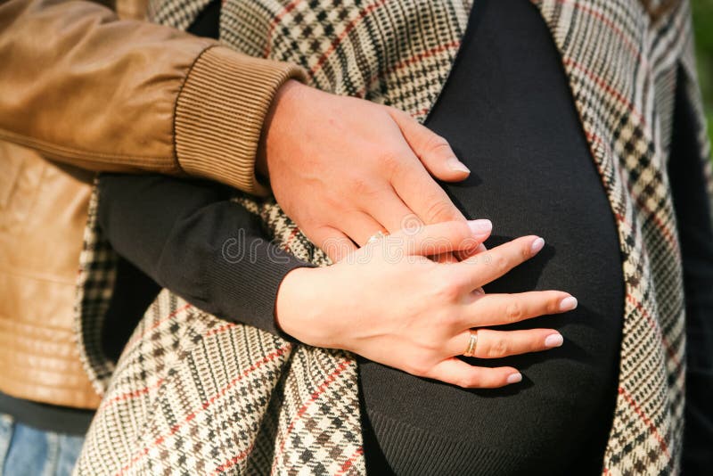 Pregnant couple close-up stock image