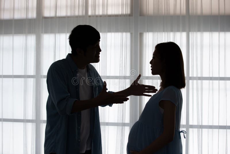 Pregnant couple quarreling royalty free stock image