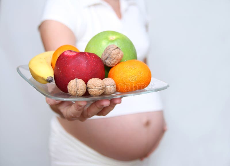 Pregnant and diet 2 stock photo. Image of hazelnut, diet 6580402