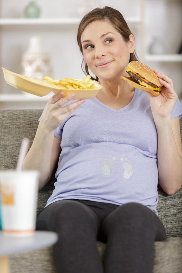 Pregnant Girl Eating Hamburger Stock Image Image of girl, burger 160937299