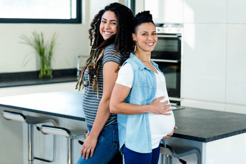 Pregnant Lesbian Couple Standing Back To Back Stock Image Image Of Couple Closeness