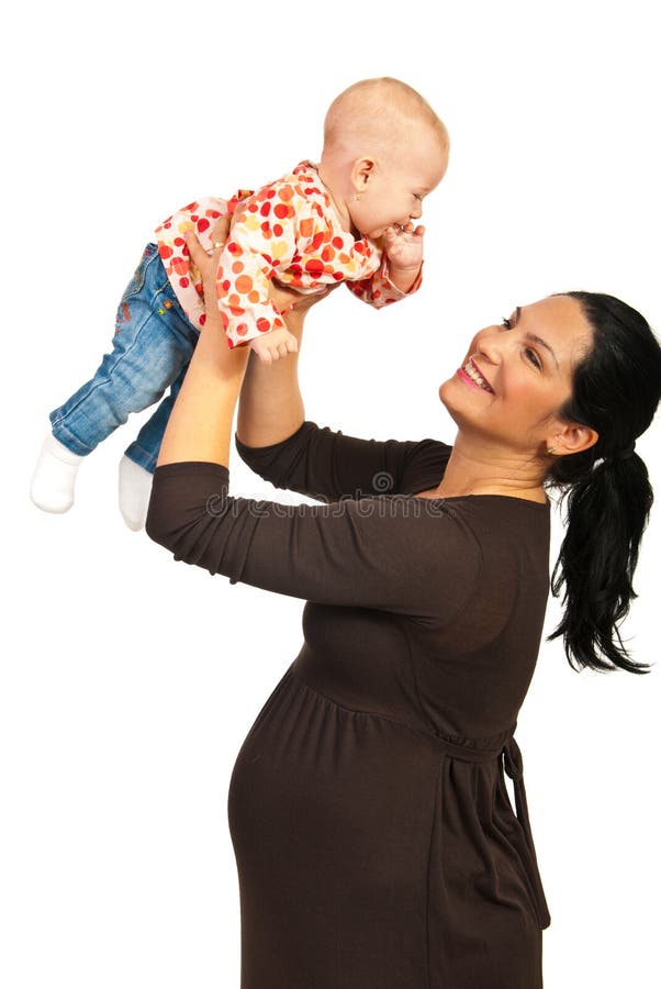 Pregnant mother playing with baby