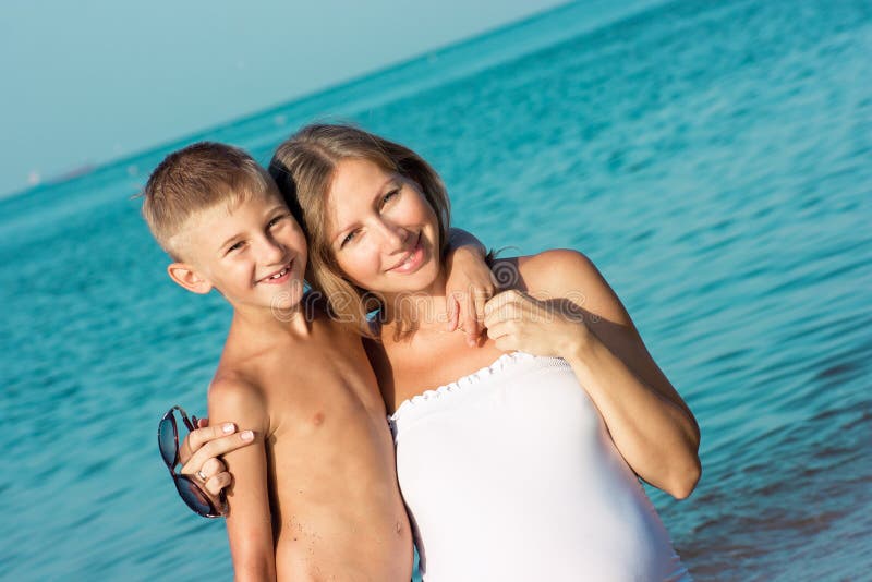 Pregnant Mother And Son Hugging Stock Photo Image Of Fondle Women