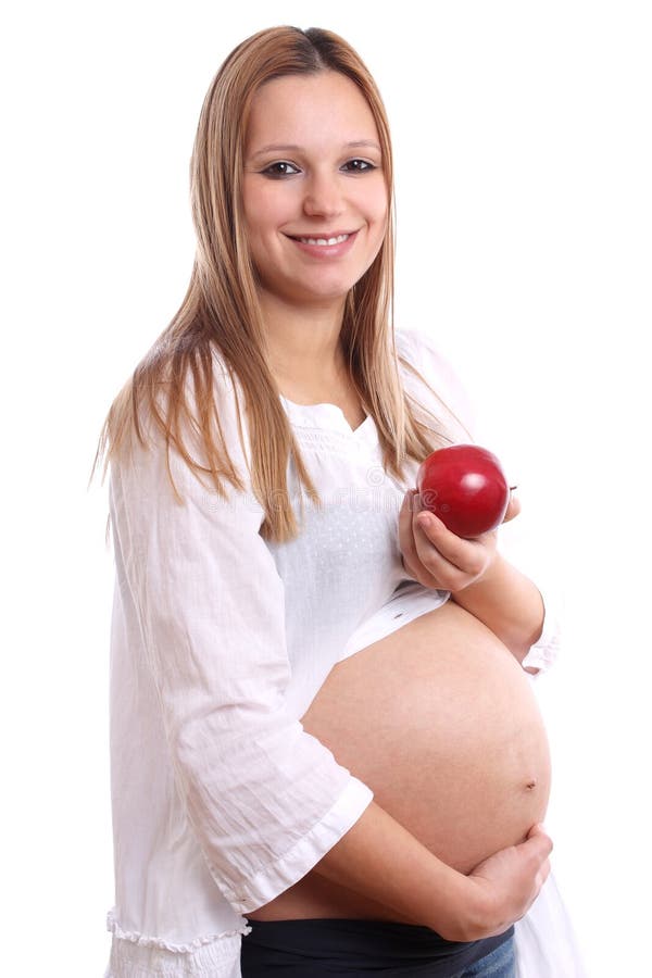 Pregnant woman with apple stock image. Image of birth 19233017