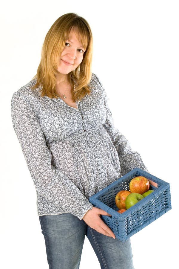 Pregnant woman with apples