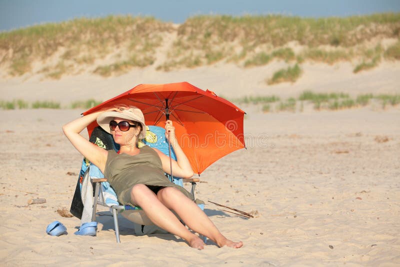 Pregnant woman on the beach