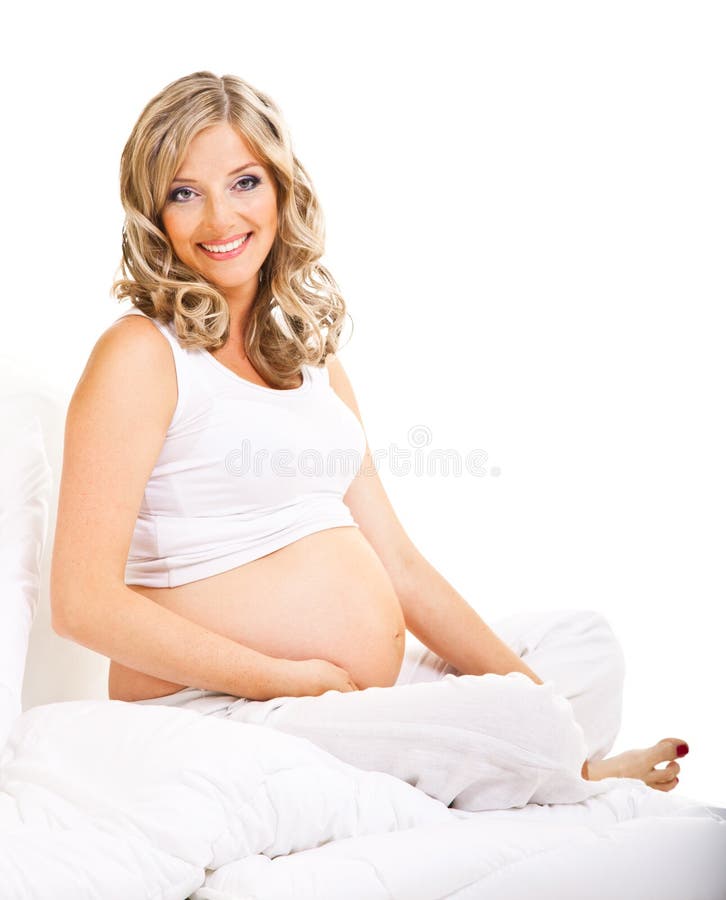 Pregnant woman in bed