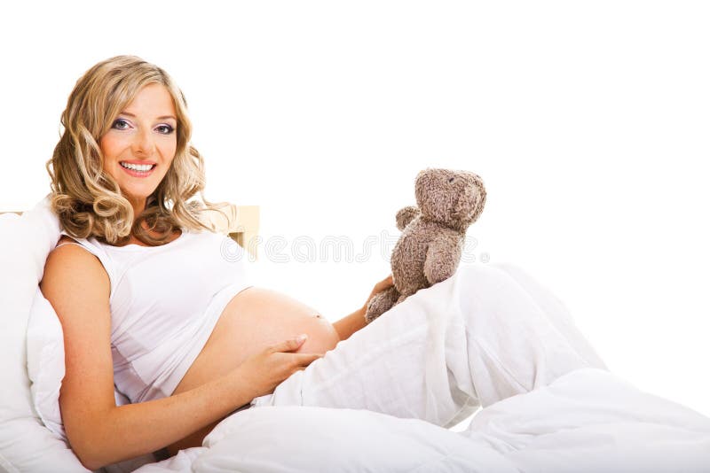 Pregnant woman in bed