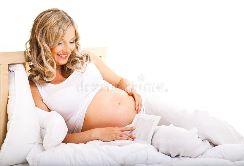 Pregnant woman in bed