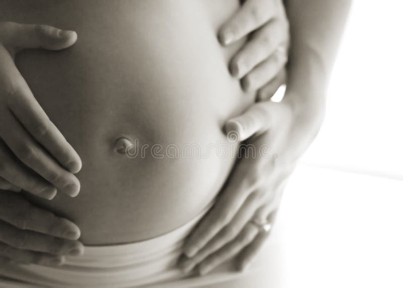 Pregnant woman belly exposed