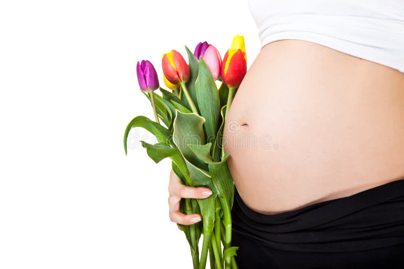 Pregnant woman belly with tulip