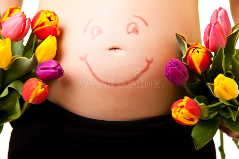 Pregnant woman belly with tulip