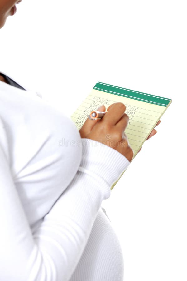 Pregnant woman choosing name for her baby stock photography Pregnant woman choosing name for her baby stock photography