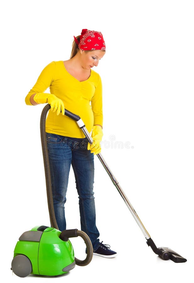 Pregnant woman clean with vacuum