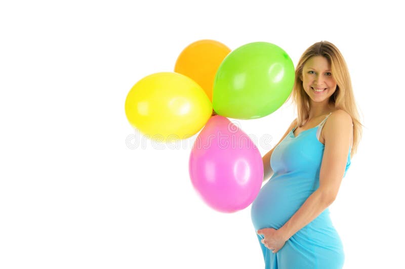 Pregnant woman with colorful balloons