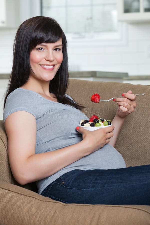 Pregnant Woman Eating Fruit Salad