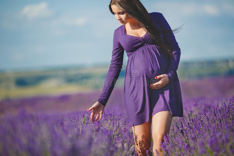 A pregnant woman is enjoying the color Lavender