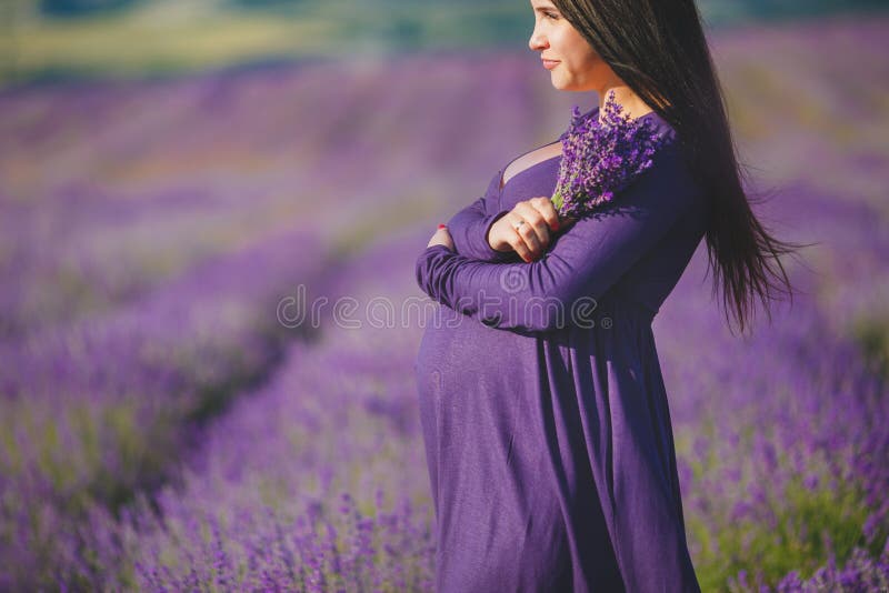 A pregnant woman is enjoying the color Lavender