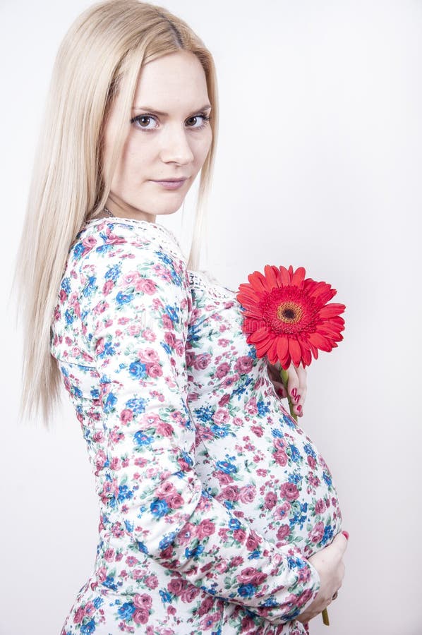 Pregnant woman with flower stock photo. Image of healthy 28102062