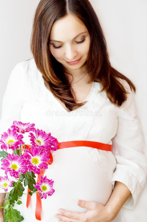 Pregnant woman and flower