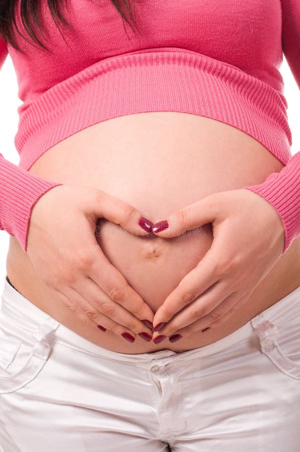 Pregnant woman holding belly