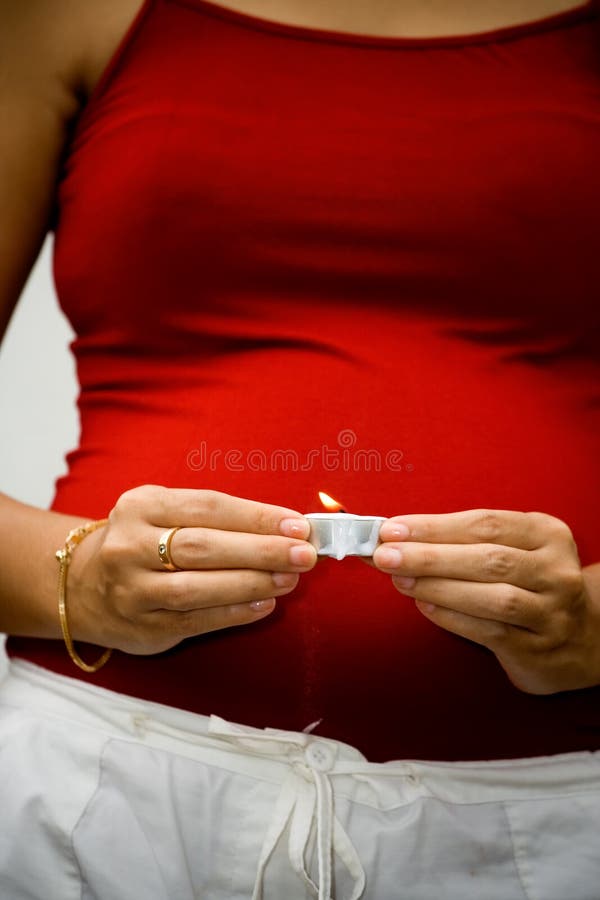 Pregnant Woman Holding Burning Candle Stock Photos Free & Royalty