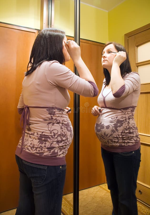 Pregnant woman makeup royalty free stock image