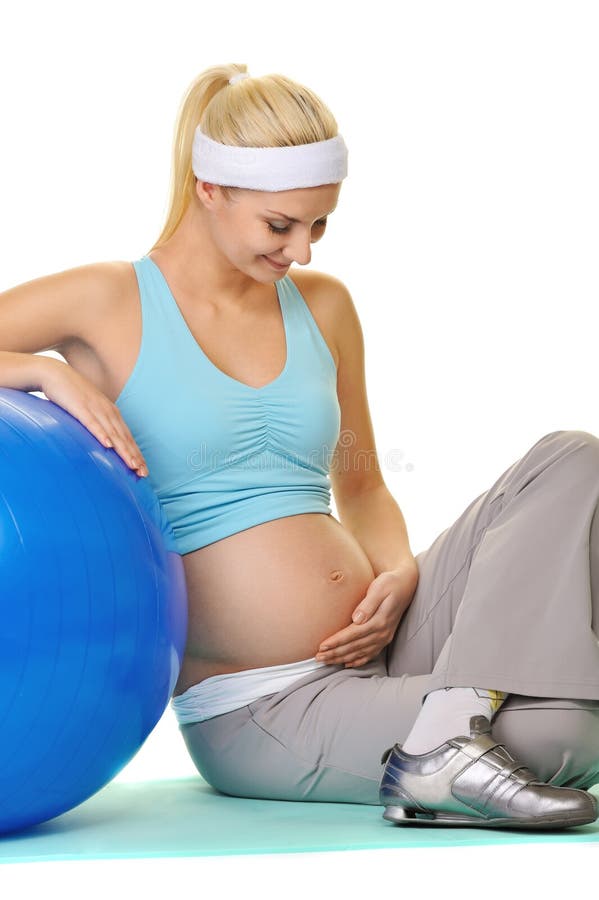 Pregnant woman making exercise