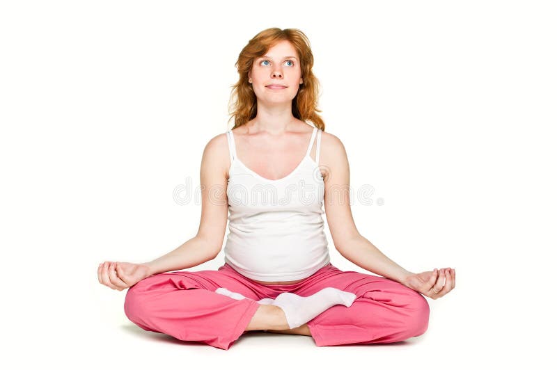 Pregnant woman is in a position lotus