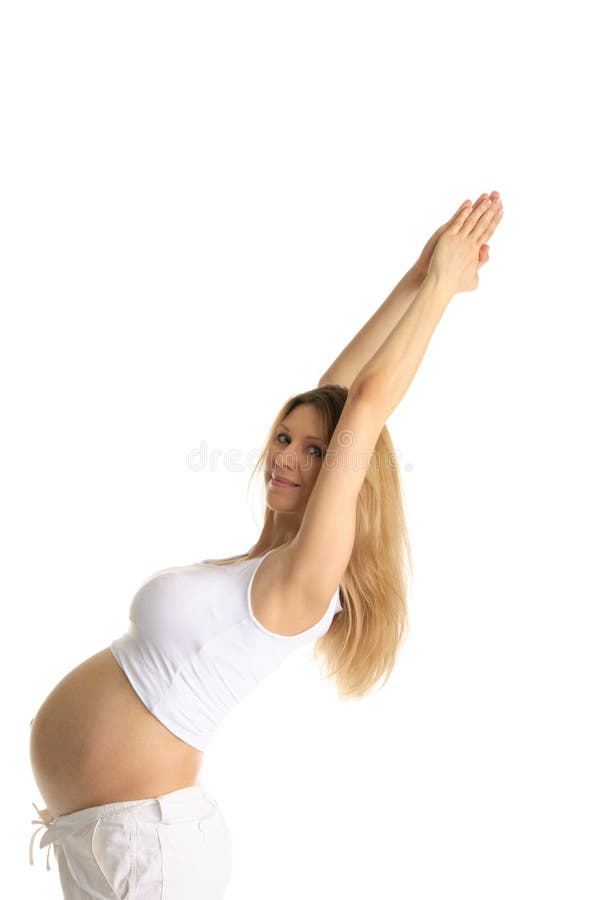 Pregnant woman practicing yoga