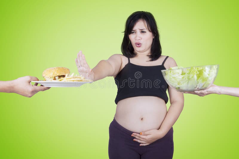 Pregnant woman reject junk food