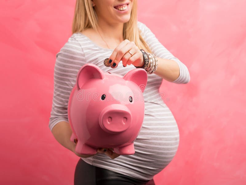 Pregnant woman saving money stock photos Pregnant woman saving money stock photos
