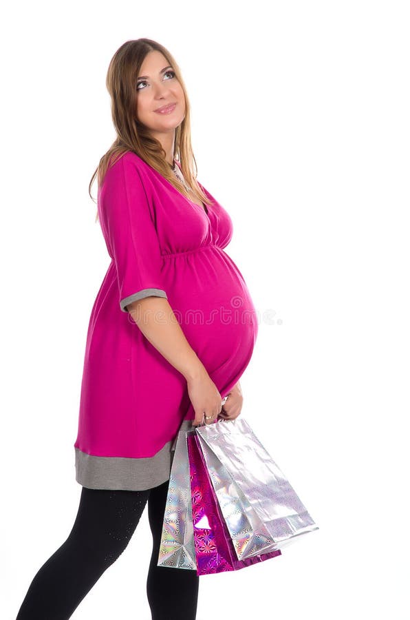 Pregnant woman with shopping bags