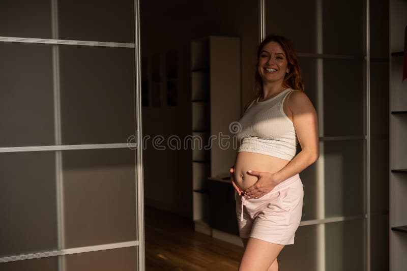 831 Pregnant Woman Shorts Stock Photos - Free & Royalty-Free Stock Photos  from Dreamstime