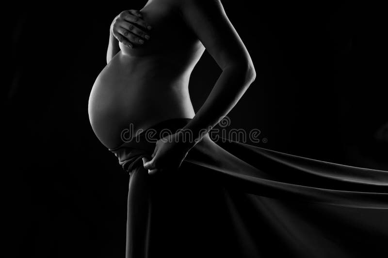 Pregnant woman in silk veil