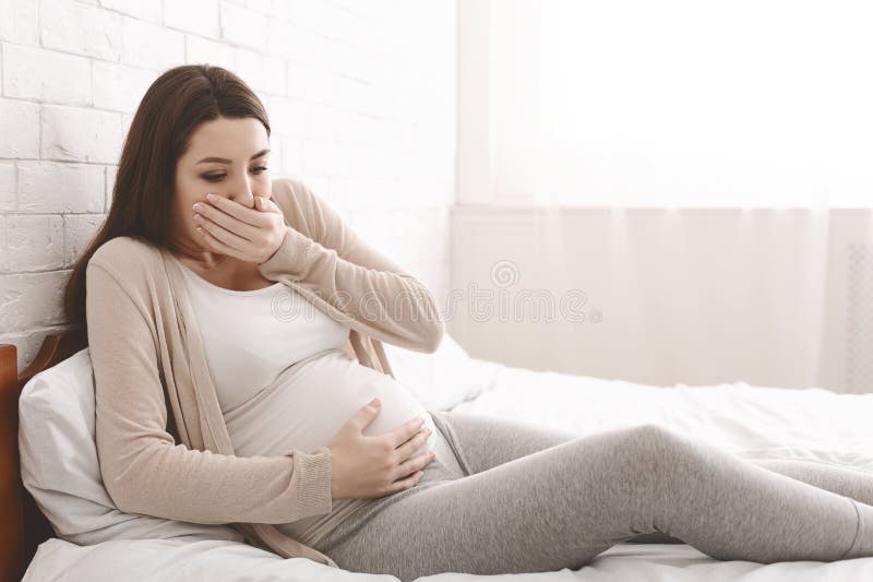 Pregnant Woman Suffering From Morning Nausea In Bed Stock Image Image