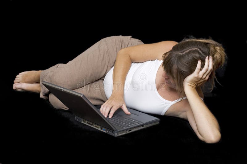 Pregnant woman surfing the net