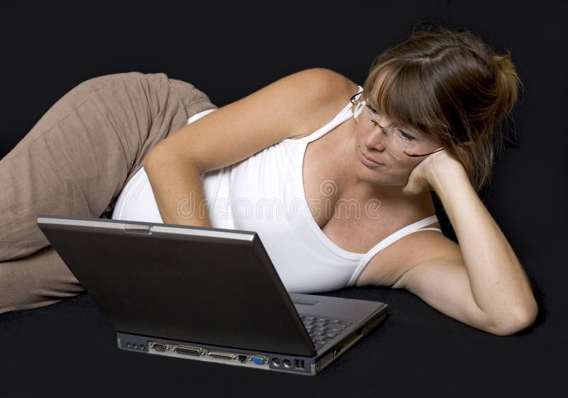 Pregnant woman surfing the net