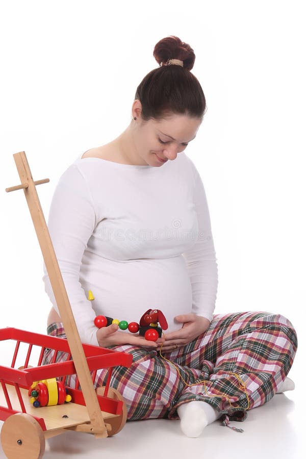 Pregnant woman and toys