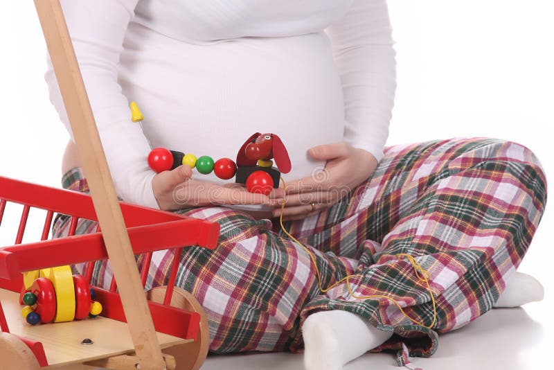 Pregnant woman and toys