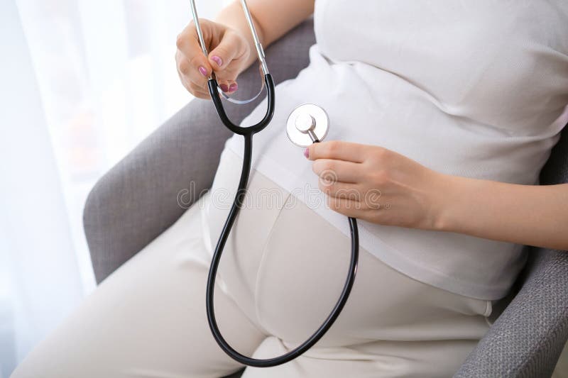 Pregnant Woman Uses a Stethoscope Stock Image Image of caucasian