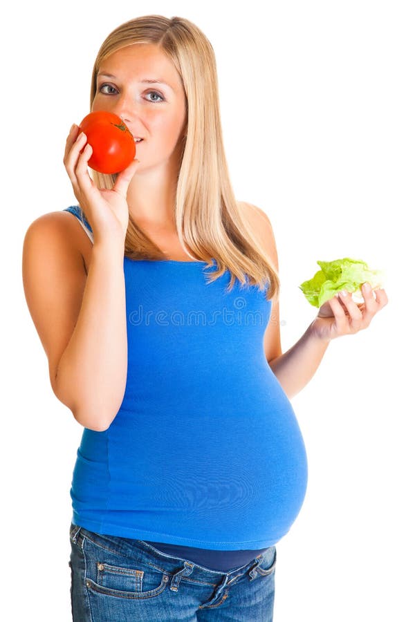 Pregnant woman with vegetables