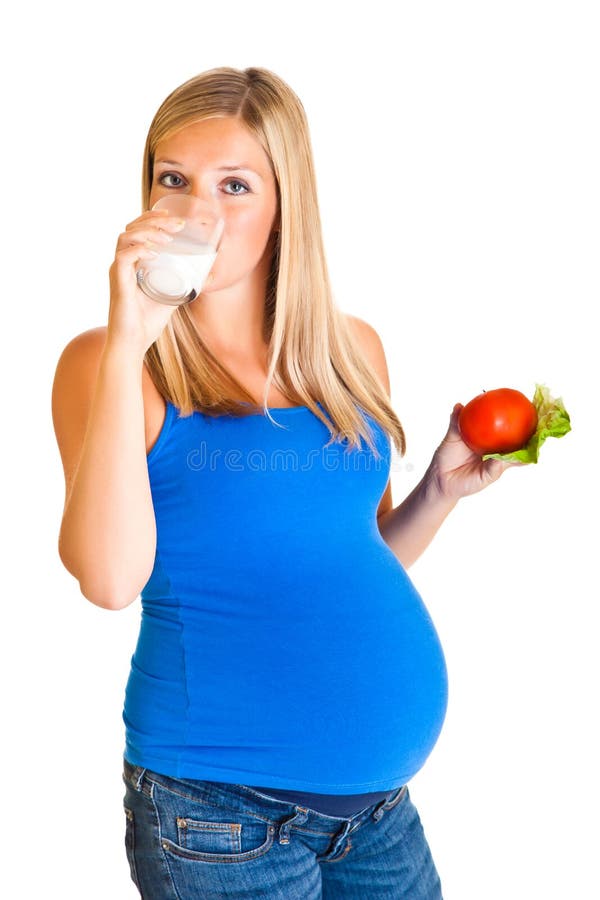 Pregnant woman with vegetables