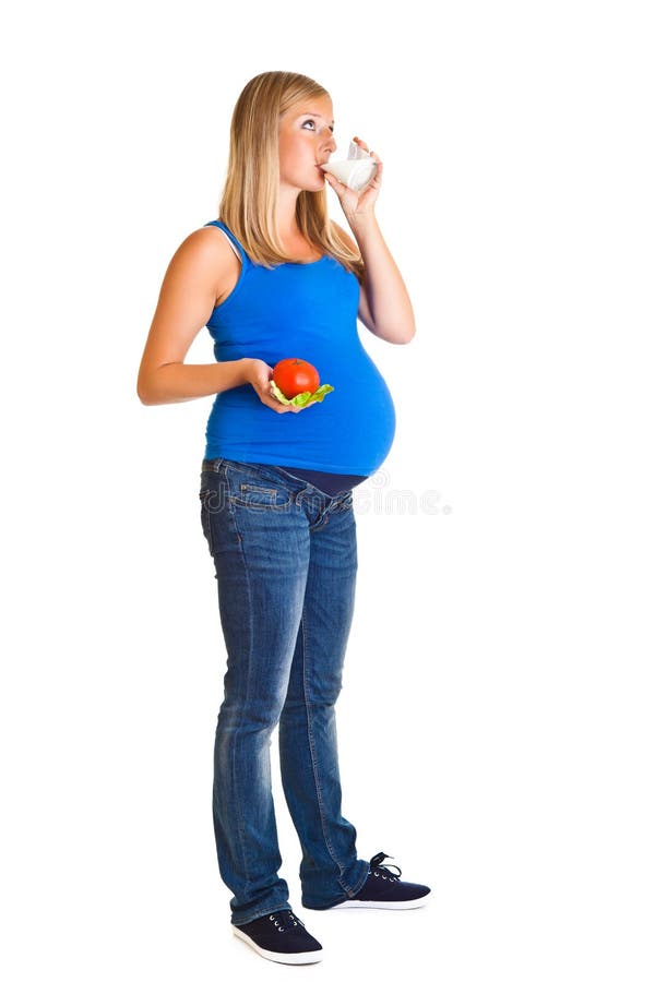 Pregnant woman with vegetables