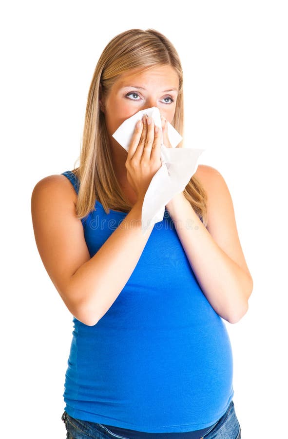 Pregnant woman wiping nose
