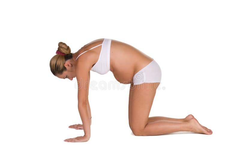 Pregnant woman in yoga posing