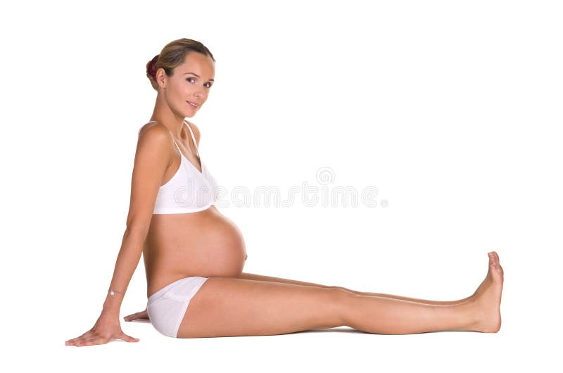 Pregnant woman in yoga posing