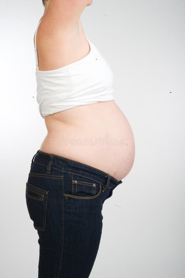 Pregnant womans stomach stock image. Image of expecting - 7212207
