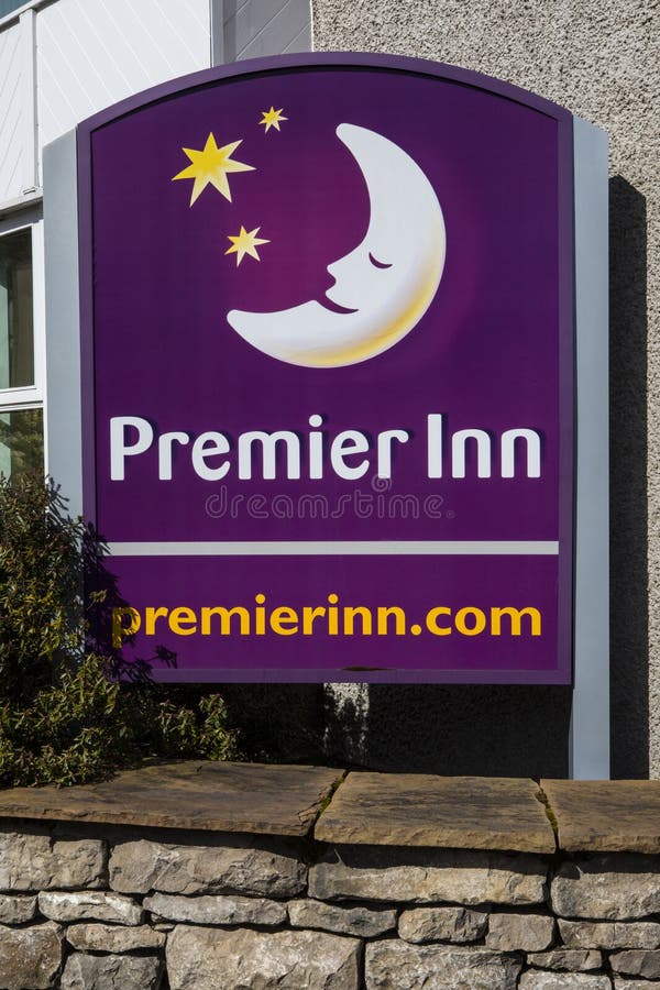 KENDAL, UK - APRIL 4TH 2017: The Premier Inn logo outside their hotel in Kendal, UK, on 4th April 2017. KENDAL, UK - APRIL 4TH 2017: The Premier Inn logo outside their hotel in Kendal, UK, on 4th April 2017.