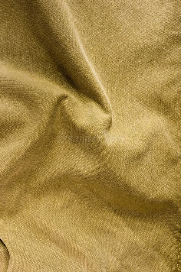 Prendas de vestir texturas de tela de algodón encaladas con costuras, vástagos, botones y remaches, macro